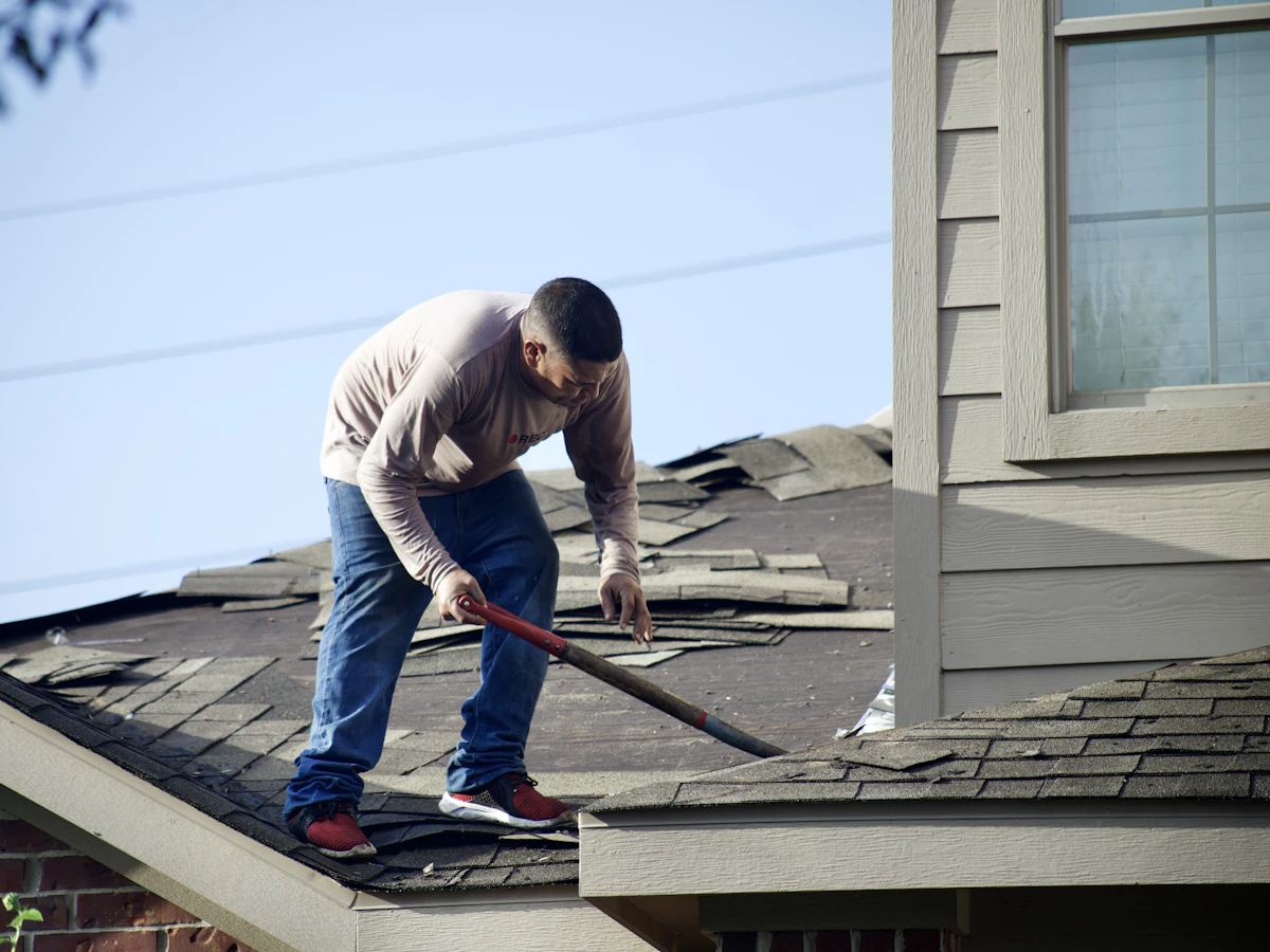Roofer at work on a roof, Alori app for roofing